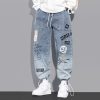 Trav x Funny Letter Light Blue Jeans